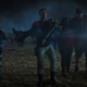 Exhausted and wounded from battle, Peacemaker, Vigilante, Economos, and Leota walk across a field strewn with bodies.